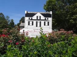 Front of sign: "Future Home, Pauli Murray Center for History and Social Justice"
